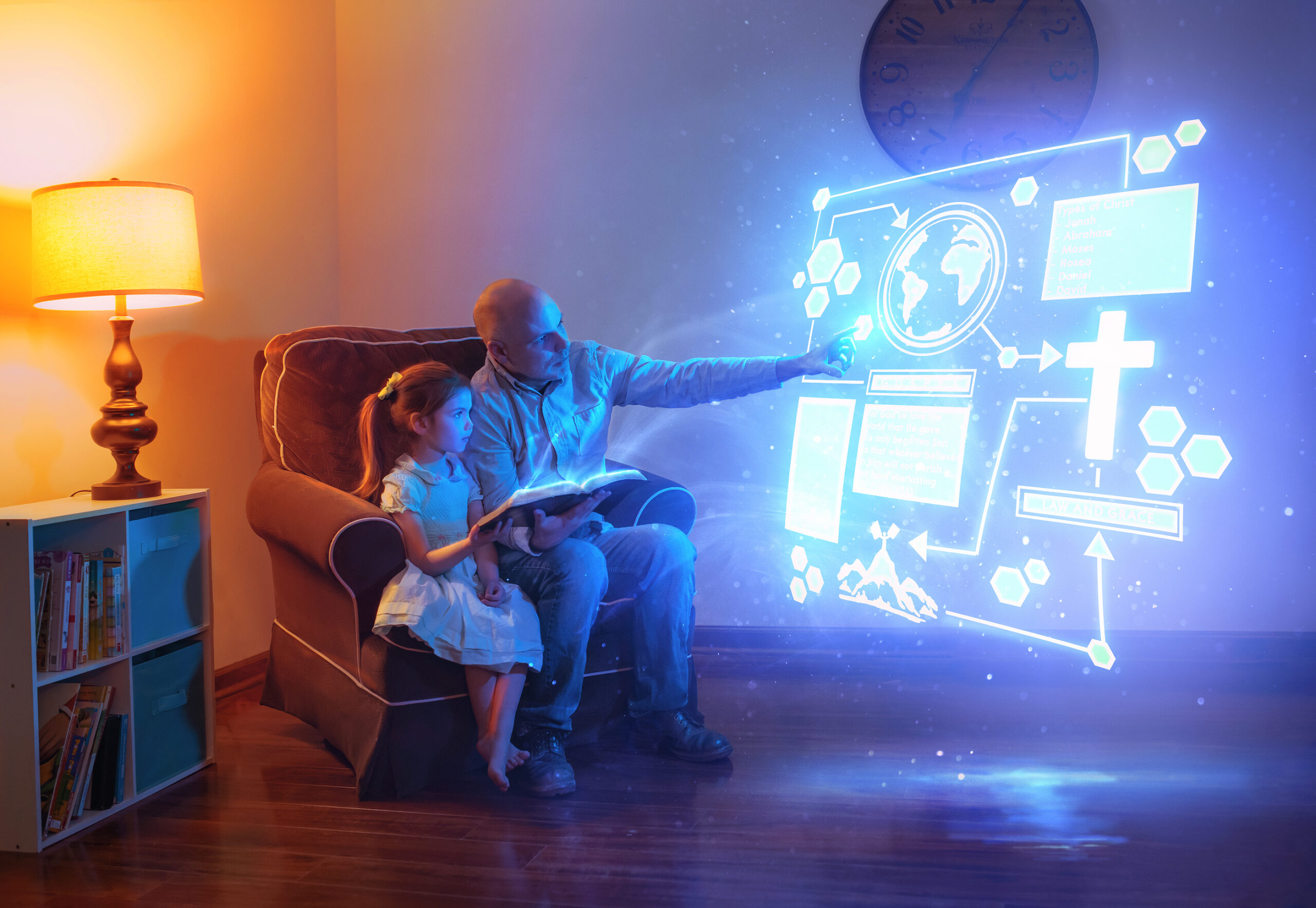 A father and daughter read a Bible with futuristic technology